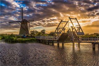  Wandbild Sonnenuntergang in Kinderdijk Holland